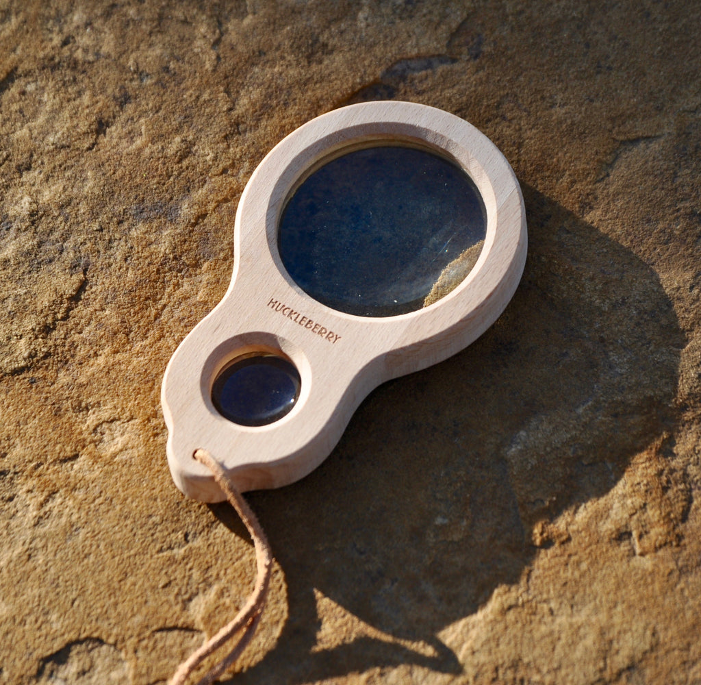 Perfect for getting your family outside to view all those, small bugs, leaves, and rocks up close 5X and 10 X magnification. Made of shatterproof glass and beech wood It comes with a carry loop to attach to backpacks.