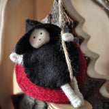This Lady Bug fairy (faerie) is dressed in plant dyed wool felt and has a bendable body, giving it the movement to fly.