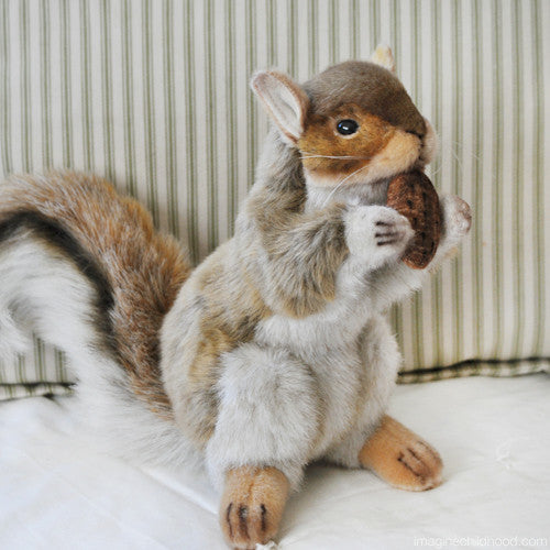 This adorable squirrel is shy and reluctant to share its food with others, but we're sure you can find a kid or two that could convince him otherwise. Individually hand crafted, true to life animal.