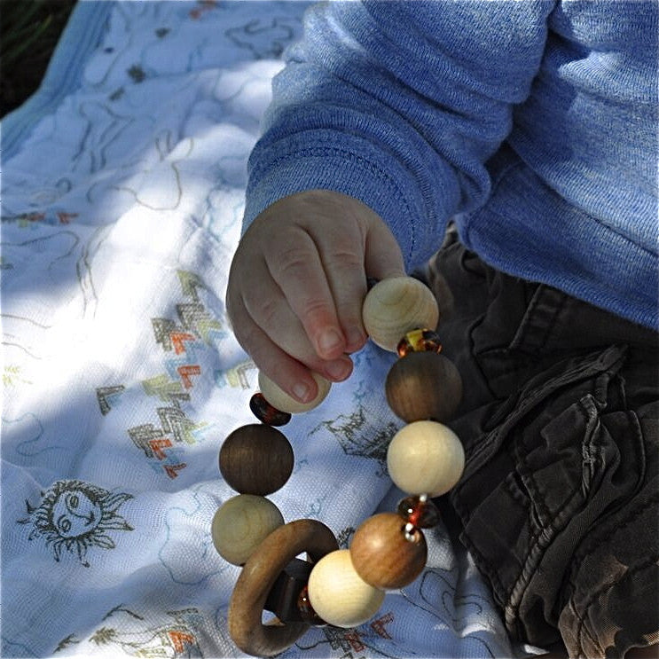 This Amber Star Touch Ring is ecological, tactile, made of the highest quality untreated natural wood and real amber