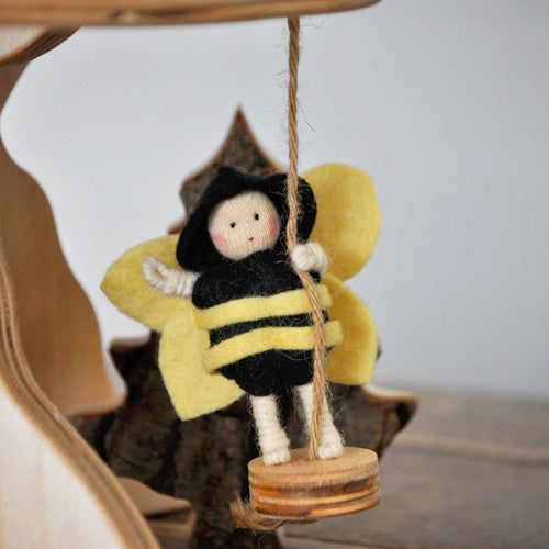 This Bumblebee fairy (faerie) is dressed in plant dyed wool felt and has a bendable body, giving it the movement to fly. Playing with this fairy connects children to nature, providing hours of real play.